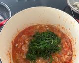 Foto del paso 6 de la receta: Arroz de calamar y guisantes