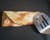 A picture of step 7 of Jaggery stuff pan cake.