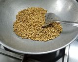 A picture of step 1 of Rasam Masala.