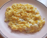 A picture of step 3 of Lazy Scrambled Eggs with Milk and Cheese.