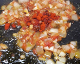 Foto del paso 5 de la receta: Paella con manitas de cerdo, níscalos y coliflor