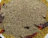 A picture of step 1 of Garam masala (with aniseed).