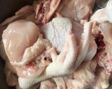 A picture of step 1 of Tinola (chicken soup).