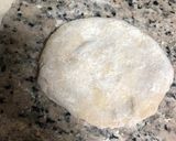 A picture of step 1 of Sweet cheesy paratha with choco syrup.