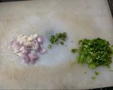 A picture of step 1 of Aloo pitika.