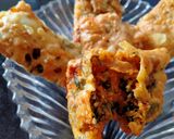 A picture of step 6 of Papad roll stuffed with green coriander and dry coconut.