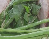 Foto langkah ke 1 dari resep Tumis Jantung Pisang Daun Singkong Buncis.
