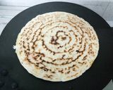 A picture of step 4 of Cheese Uttapam pizza style.