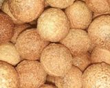 A picture of step 6 of Indian snack (crisp sphere with flavoured water/curd mixture).