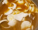 A picture of step 5 of Bistec encebollado.