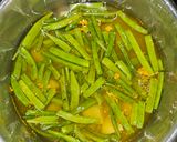 A picture of step 2 of Guvar batata.