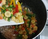A picture of step 2 of Tom yum shrimp rice.
