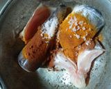 A picture of step 1 of Fish head curry with tomato.