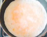 A picture of step 3 of Fried Eggs​ with Milk.