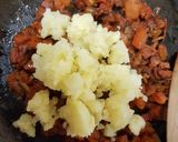 A picture of step 5 of My Chorizo, Tomato & Stuffed Potato 😁.