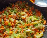 A picture of step 2 of Broken Wheat Upma.