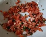 Foto del passaggio 4 della ricetta Pomodori cuore di bue con stracchino e acciughe