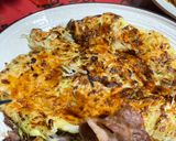 A picture of step 3 of Okonomiyaki with Sauce.