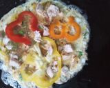 A picture of step 4 of Cheesy chicken n bell peppers omelet.