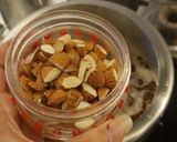 A picture of step 3 of Meva rice (jaggery) (dry fruits rice).