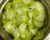 A picture of step 1 of Lauki Bharta (Mashed Bottle Gourd Curry).
