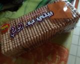 صورة لخطوة 1 من وصفة كيكة باردة بالبيسكوي والفلون