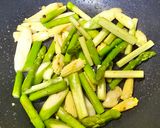 A picture of step 2 of XO Sauce Asparagus with Shrimp and Scallops.