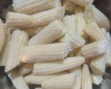 A picture of step 1 of Baby Corn Massala.