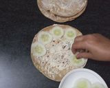 A picture of step 2 of Sandwich pizza from leftover Roti.