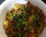 A picture of step 3 of Tomato ghost with bhindi.