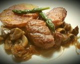 Foto del paso 12 de la receta Solomillo de cerdo con champiñones y cebolla caramelizada