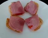 A picture of step 4 of My open toasted Garlic Cheese bread with ham + Tomato 🤩.