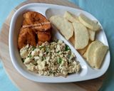 A picture of step 5 of Fried plantain,yam with scrambled eggs.