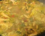 A picture of step 3 of Paella with Frozen Seafood Mix and Vegetables 🥘.