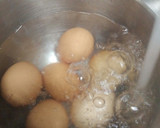 A picture of step 2 of Deviled Eggs in a Salad.