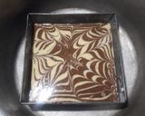 A picture of step 9 of Marbal cake👩‍🍳👩‍🍳😋😋.