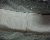 Foto del paso 4 de la receta Pastel frío de pan de molde, salmón y surimi