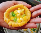 A picture of step 4 of Corn cheese stuffed flattened rice balls.