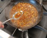 A picture of step 8 of Chicken sauté chasseur.