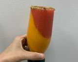A picture of step 1 of Layered Mango 🥭 & Strawberry 🍓 Smoothie.