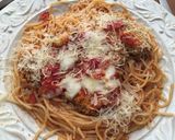 Foto del paso 13 de la receta: Milanesa de pollo parmesano sobre pasta pomodoro
