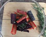 A picture of step 3 of Rosemary roasted carrots.