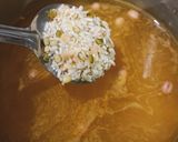 A picture of step 2 of Kathiyawadi Masala Khichdi.