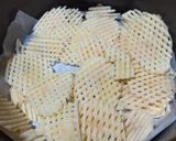 Foto del paso 2 de la receta: Papas rejilla en airfryer