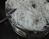 A picture of step 12 of Colourful Stringhoppers with Crab stew.
