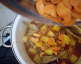 A picture of step 10 of Potatoe chicken soup.