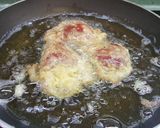 Foto del paso 5 de la receta Pimientos rellenos de bacalao con salsa de tomate y pimientos