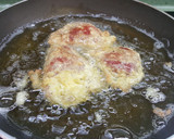 Foto del paso 5 de la receta: Pimientos rellenos de bacalao con salsa de tomate y pimientos