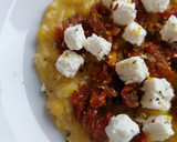 Foto del paso 7 de la receta: Huevos revueltos con tomate en aceite y daditos de queso