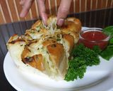 A picture of step 4 of Pull apart Herby Cheese Garlic Bread.